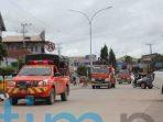 Satgas Covid-19 Semprot Desinfektan Sepanjang Jalan Yos Sudarso Satgas Covid-19 Semprot Desinfektan Sepanjang Jalan Yos Sudarso