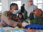 AKBP Welly Djatmoko Tinjau Langsung Vaksin di SDN 007 Sangatta Utara