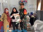 Kelurahan Teluk Lingga Bagikan 169 Karung Beras Bulog 10Kg