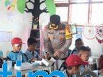 Polres Kutai Timur Bagikan Makanan Bergizi Gratis di SDN 006 Sangatta Utara