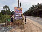 Polsek Muara Wahau Pasang Spanduk Himbauan Sadar Lalu Lintas