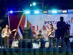 Kresna Band Polres Kutim Ramaikan Pesta Adat Pelas Tanah
