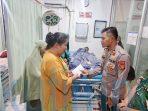 Kapolres Kutim AKBP Fauzan Bantu Anak Korban Terkaman Buaya Kapolres Kutim AKBP Fauzan Bantu Anak Korban Terkaman Buaya