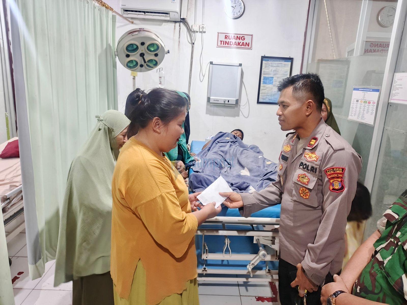 Kapolres Kutim AKBP Fauzan Bantu Anak Korban Terkaman Buaya