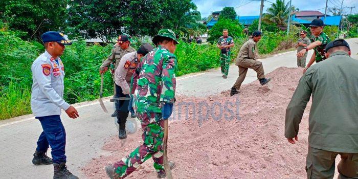 Polsek Muara Ancalong Buktikan Polisi Hadir untuk Rakyat, Jalan Rusak di Kelinjau Ilir Kini Lebih Aman