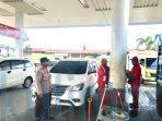 SPBU Depan STC Sangatta Dijaga Polisi, Pengisian BBM Diawasi Ketat