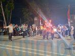 Polsek Kawal Pawai Obor Sangatta Utara Polsek Kawal Pawai Obor Sangatta Utara