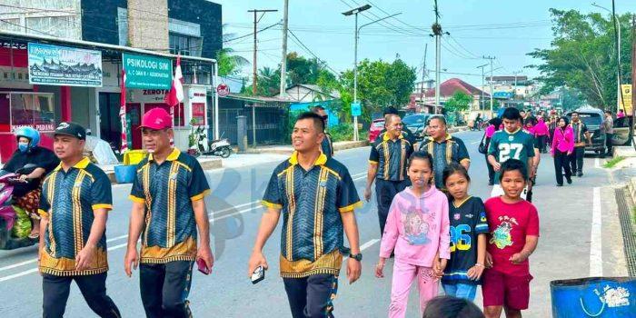 Semarak HUT RI ke-81, Polsek Sangatta Utara Gelar Jalan Santai hingga Bakti Kesehatan