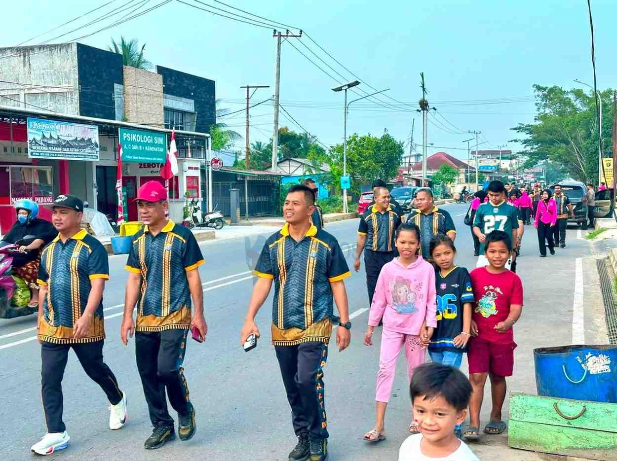 Semarak HUT RI ke-81, Polsek Sangatta Utara Gelar Jalan Santai hingga Bakti Kesehatan