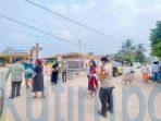 Program Quick Wins Kapolri, Polsek Sangatta Utara, Bagikan Masker kepada Jemaat Gereja Program Quick Wins Kapolri, Polsek Sangatta Utara, Bagikan Masker kepada Jemaat Gereja