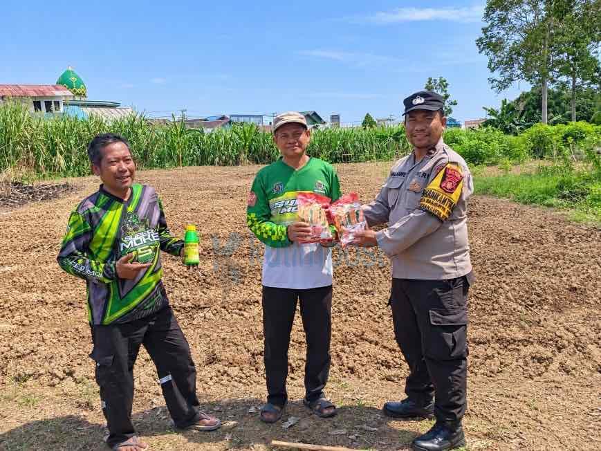 Polsek Sangatta Utara Salurkan Bibit Jagung untuk Petani